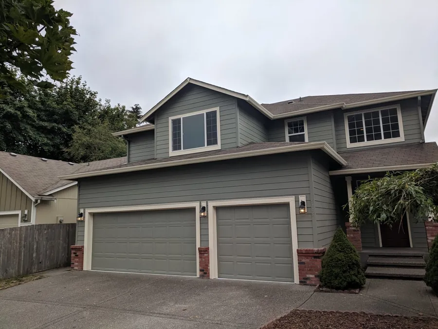 Large two-story house with a three-car garage